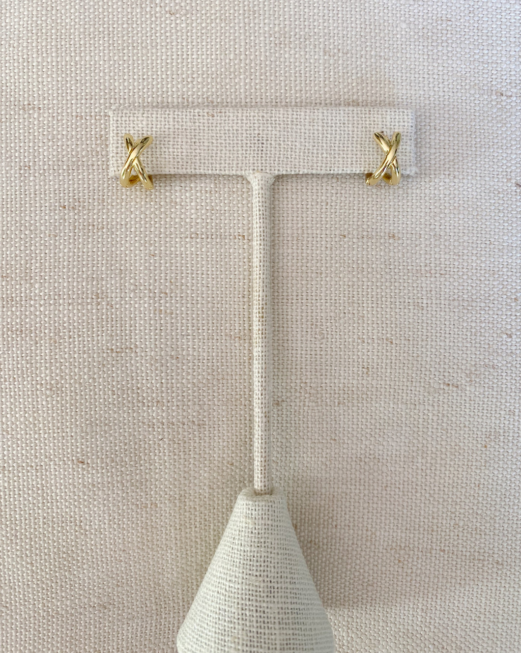 X earrings
