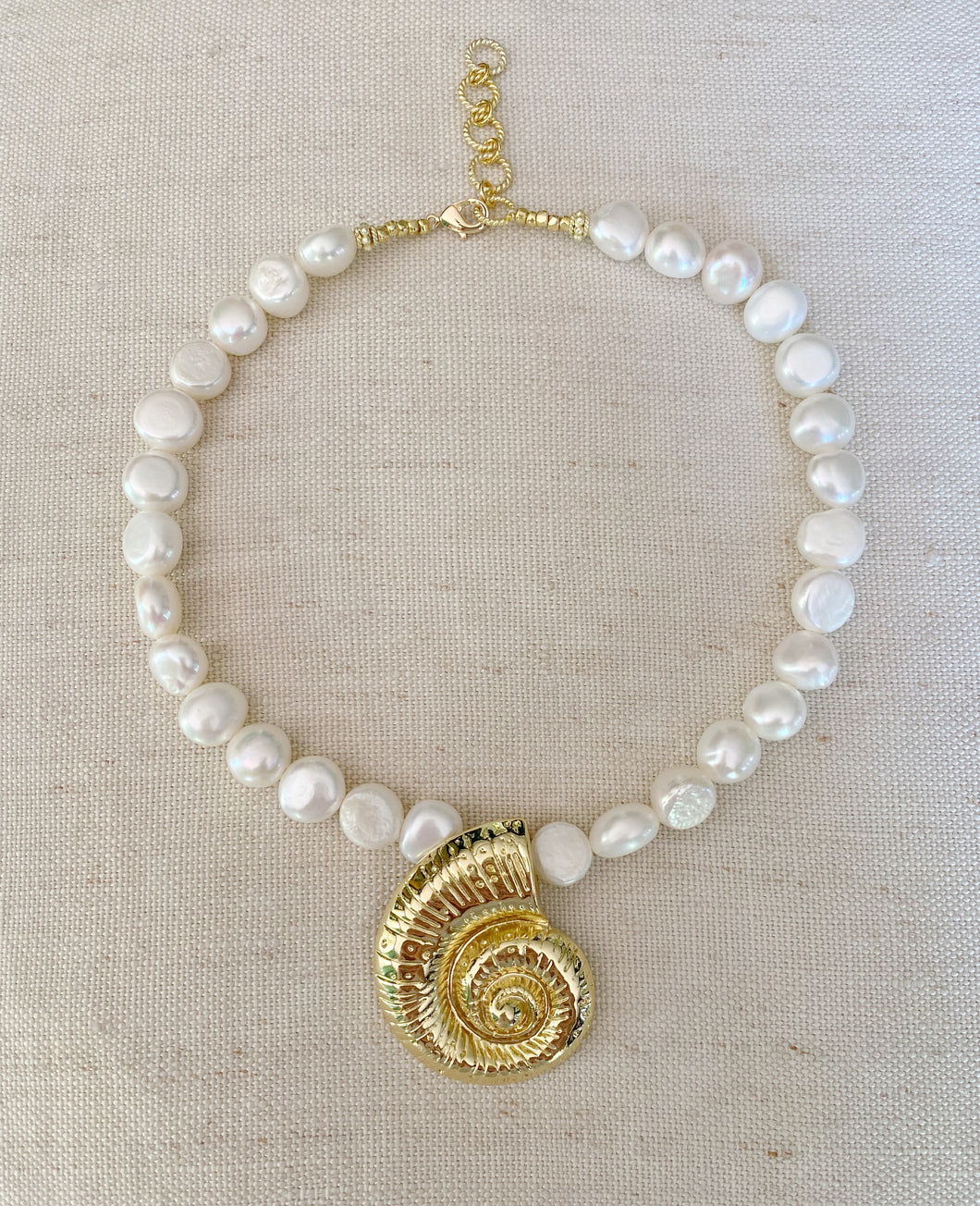 Shell Pendant on Pearl necklace