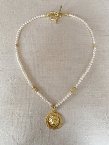 Lion Pendant on Pearl necklace