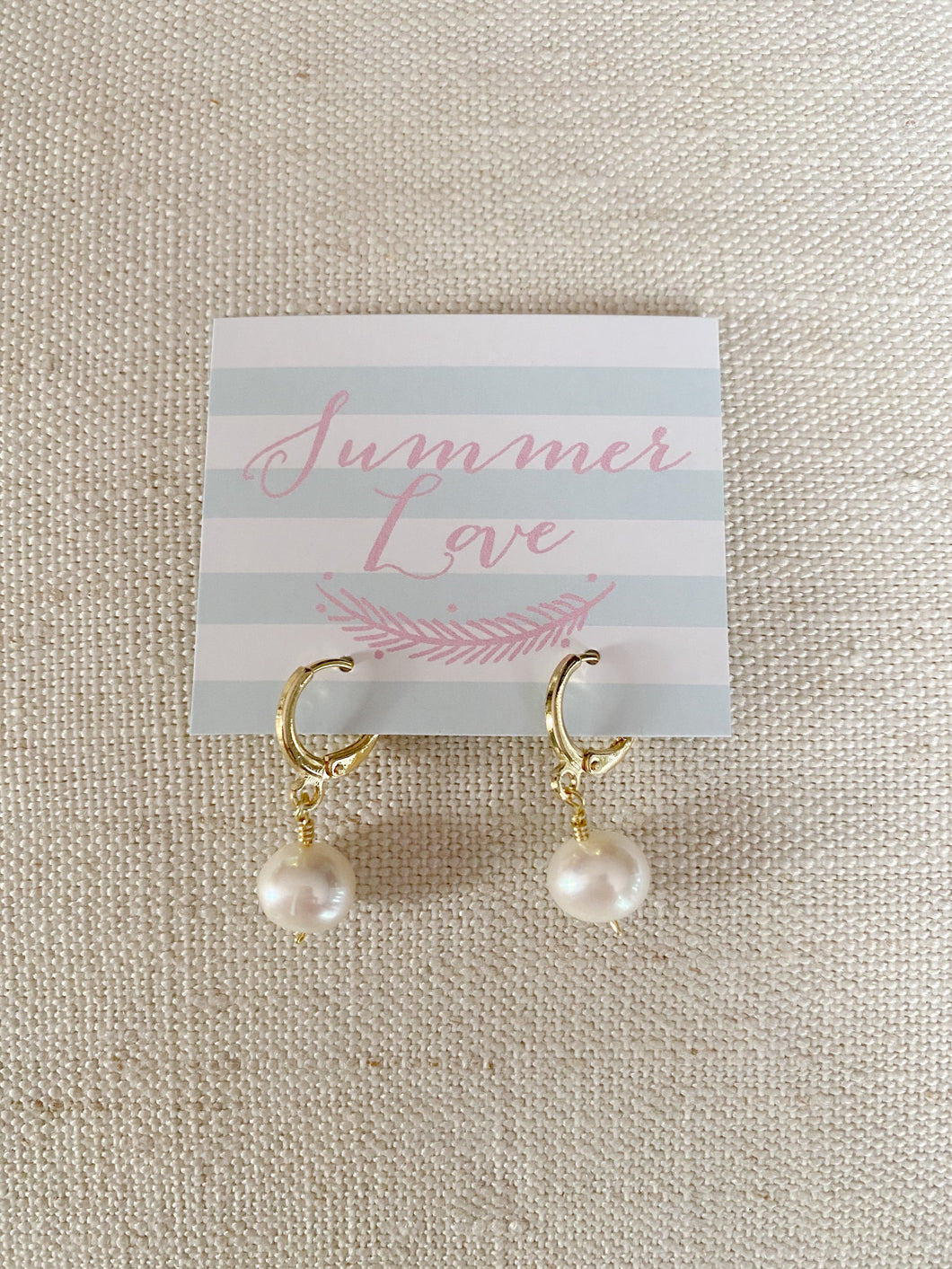 Pearl Huggie earrings